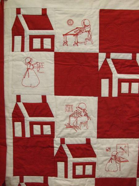Patchwork quilt in red and white